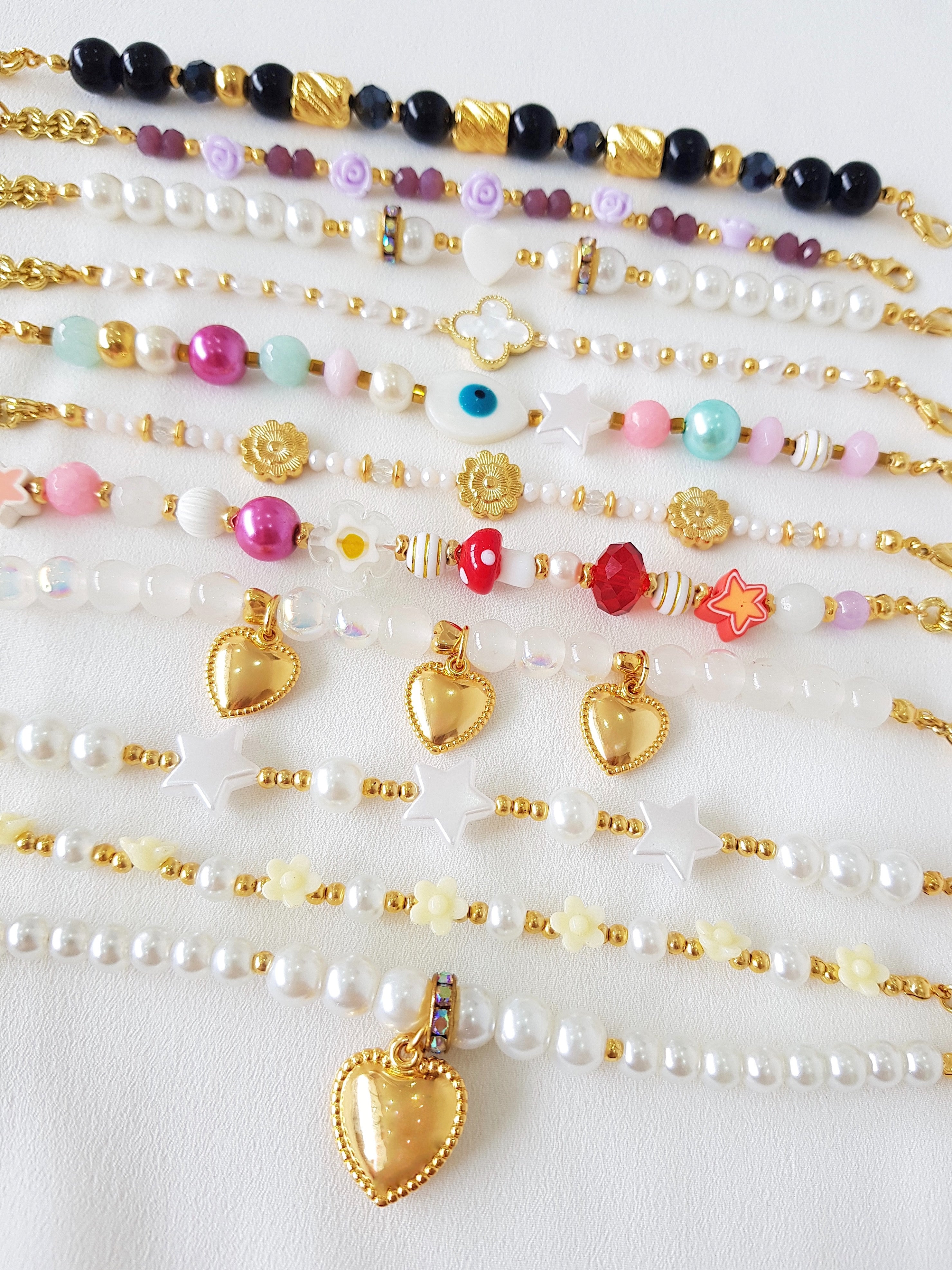 PULSERA ROSITAS LILA