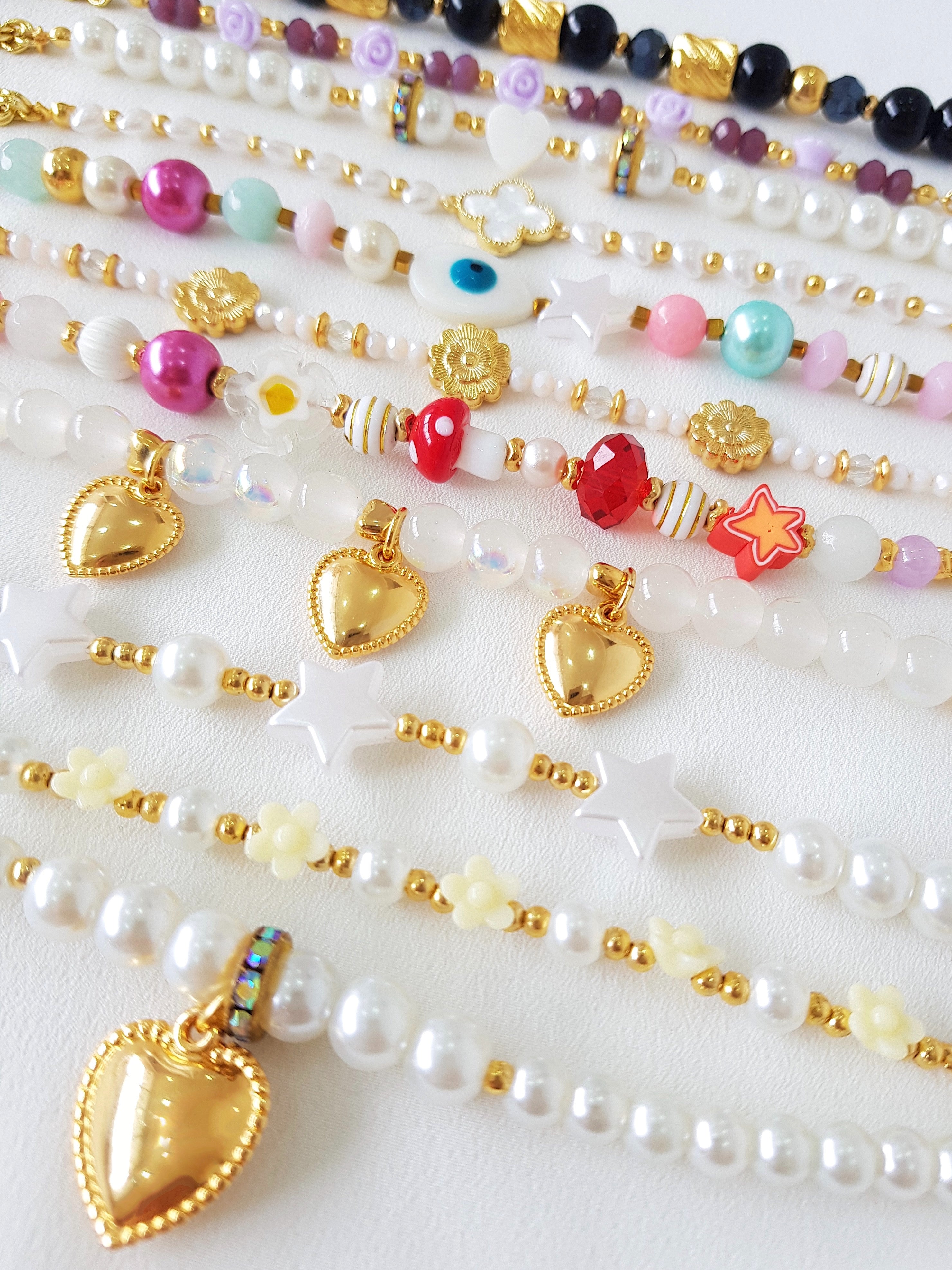 PULSERA ROSITAS LILA